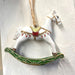 Cavallino a dondolo da appendere - Decorazione natalizia Dondolo Verde MillStore (2492575)